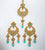 Antique gold plated topaz polki with blue embedded stones and blue drops with matching earrings and tikka