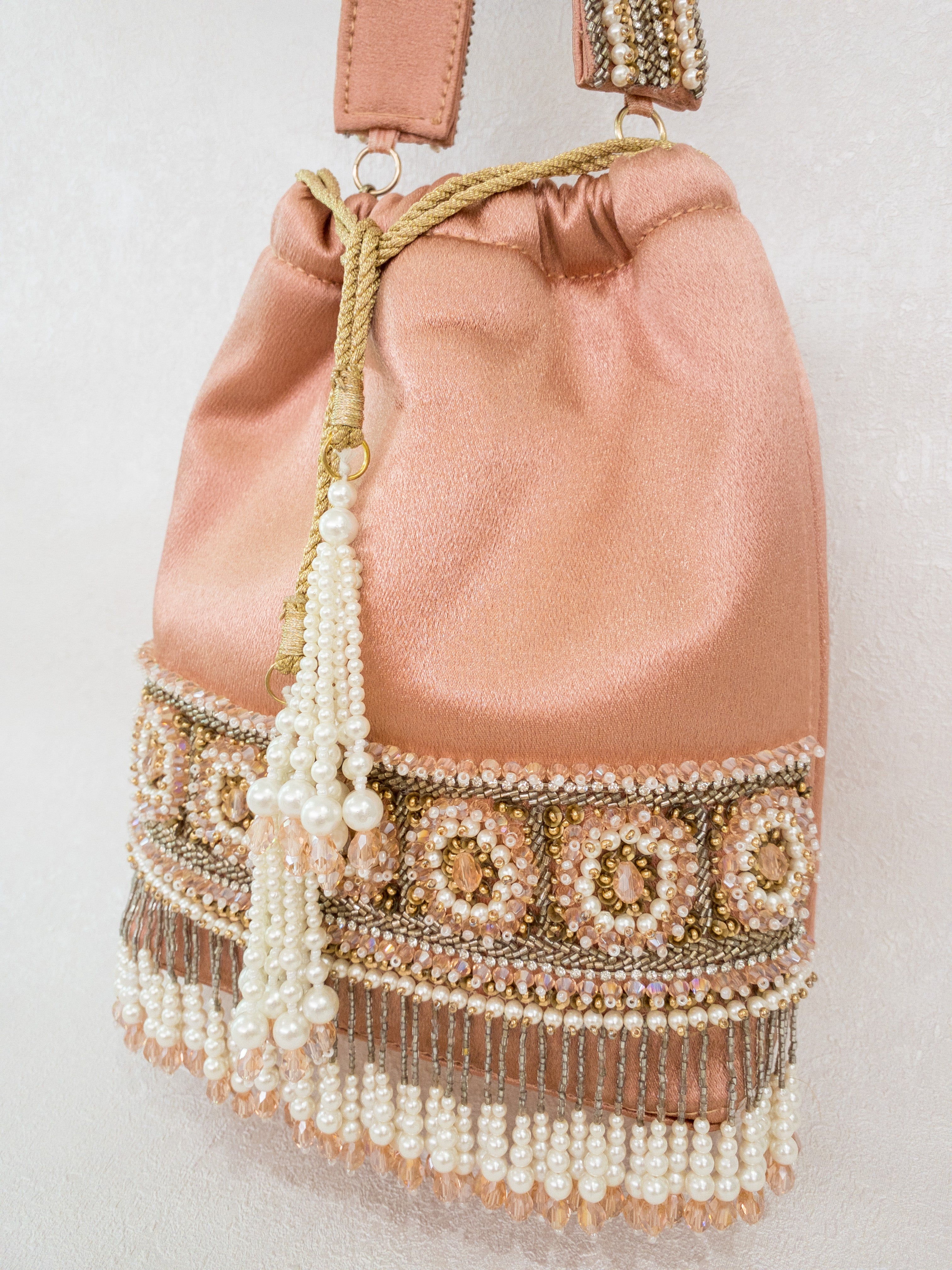 Peach Satin Pearl and Antique Gold Beaded Design Potli Handbag